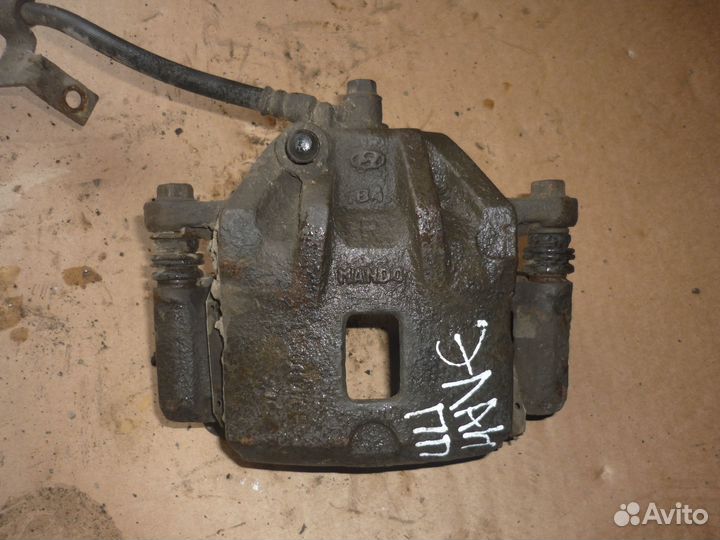 Суппорт передний правый Хундай Элантра 3 XD