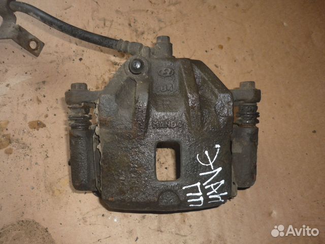 Суппорт передний правый Хундай Элантра 3 XD