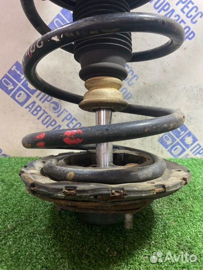 Амортизатор подвески передний левый Nissan Murano