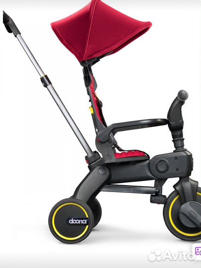 Детский велосипед с ручкой doona