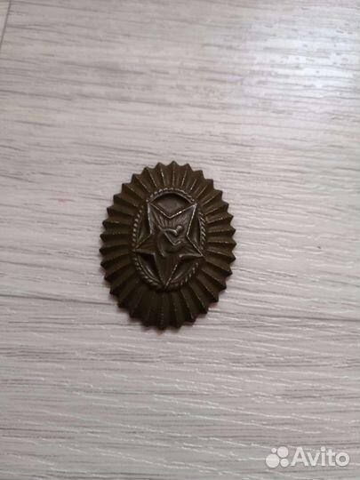 Кокарды, эмблемы