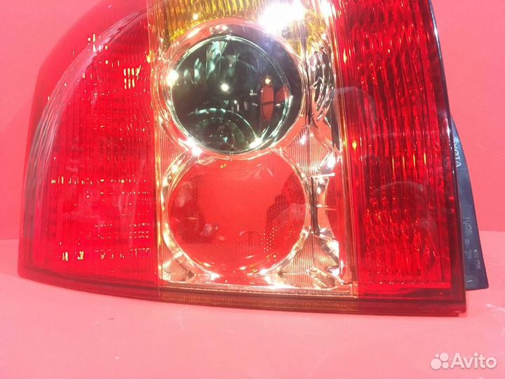 Фонарь задний левый Toyota Corolla E12 хетчбэк