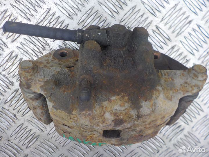 Суппорт тормозной передний правый Mitsubishi Lance