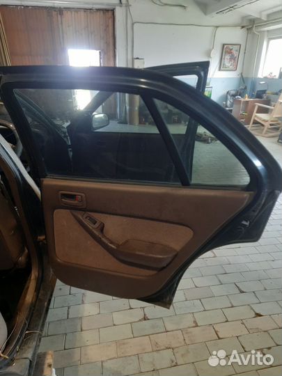Дверь на toyota camry 10