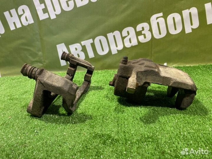 Суппорт тормозной передний правый Nissan Teana J31