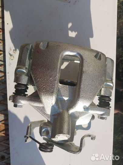 Суппорт тормозной задний.Форд транзит 6