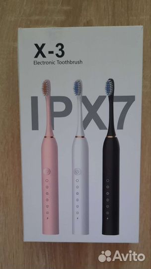 Электрическая зубная щетка