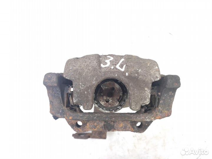 Суппорт тормозной задний левый Toyota Avensis
