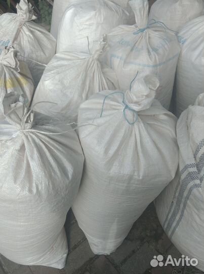 Опилки в мешках