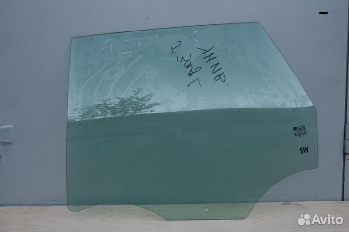 Стекло заднее левое универсал Опель Астра J Джей