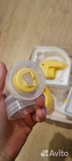 Молокоотсос medela электрический