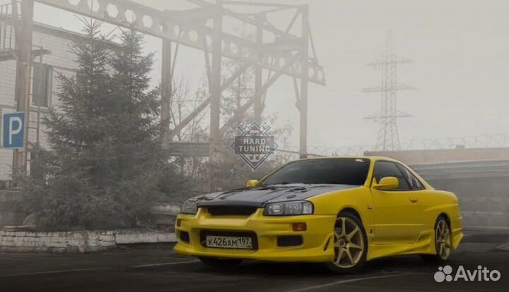 Передний бампер C-West Nissan Skyline R34