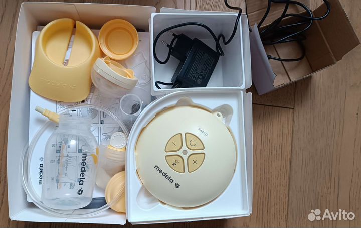 Молокоотсос Medela Swing, пакеты и вкладыши