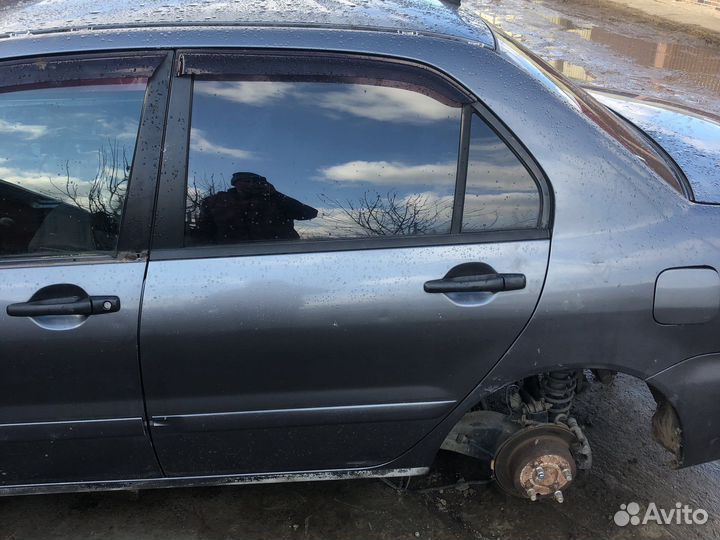 Задняя левая дверь Mitsubishi Lancer 9