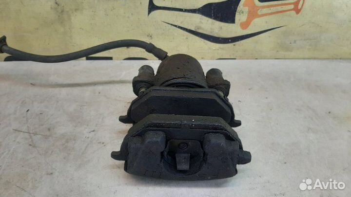 Суппорт тормозной передний левый Skoda Octavia А5