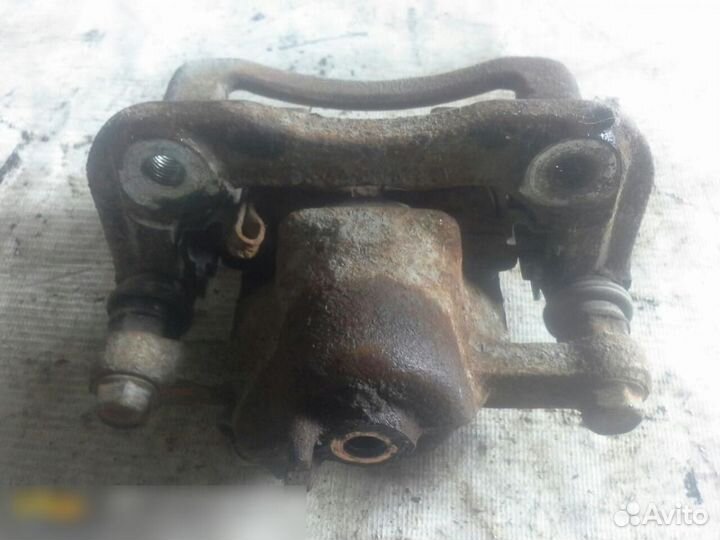 Суппорт задний правый Hyundai Tucson 2004-2010