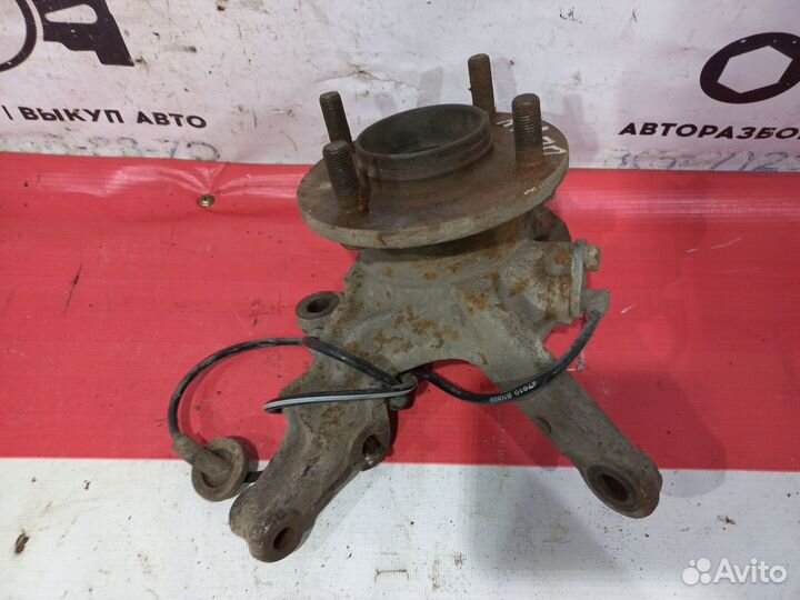 Передний правый кулак Nissan Almera N16