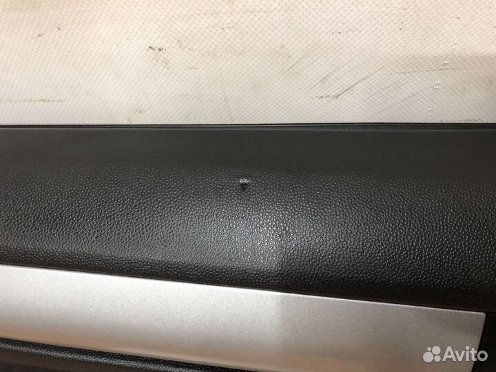 Обшивка передней левой двери Opel Astra h