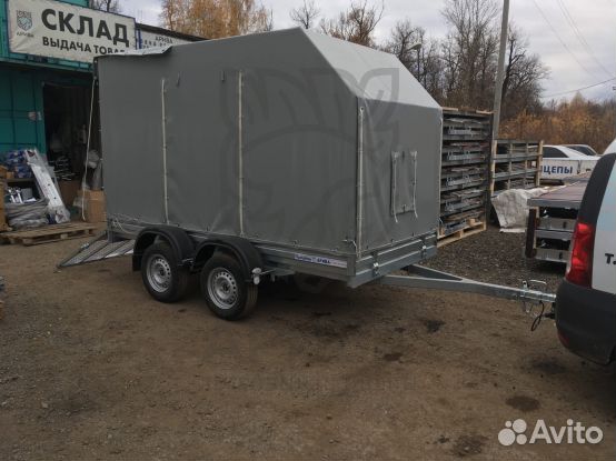 Прицеп 31.022 с трапом и евро тентом. Строительный