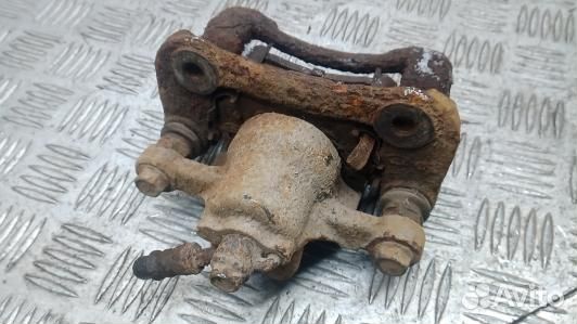 Суппорт тормозной задний правый KIA sportage 3 (7NK15OP01)