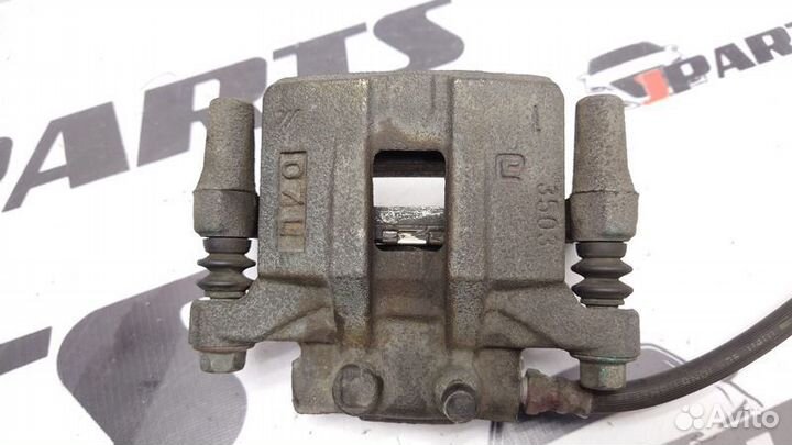 Суппорт тормозной задний Mitsubishi Outlander II