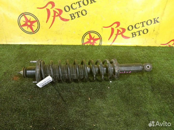 Стойка задняя левая Toyota Vitz NCP15 2NZ-FE 1999