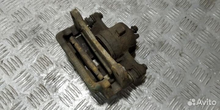 Суппорт передний правый Nissan Micra k11 K11