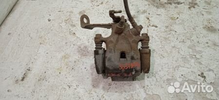 Суппорт задний левый