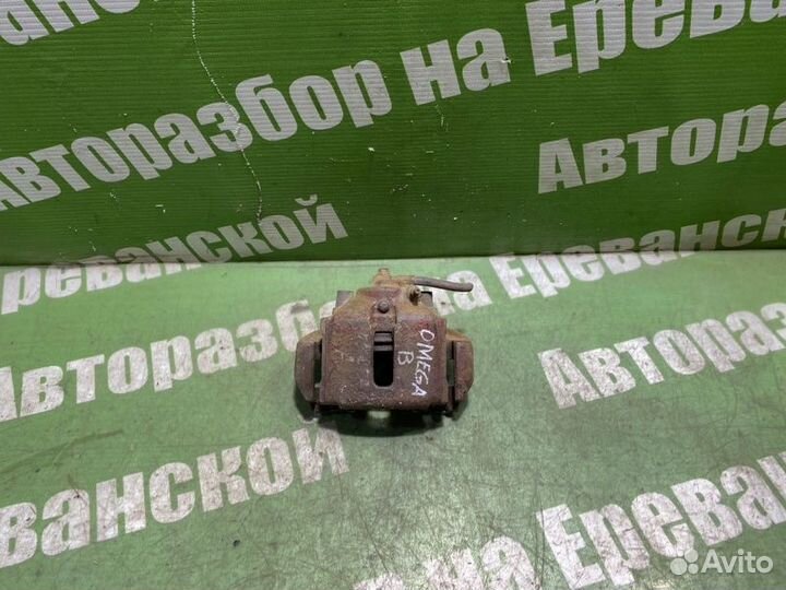 Суппорт тормозной передний правый Opel Omega B