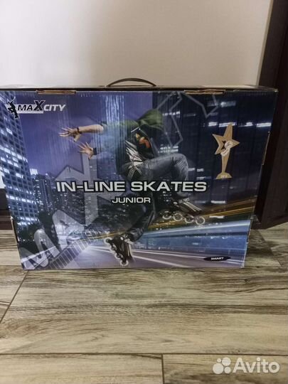 Роликовые коньки