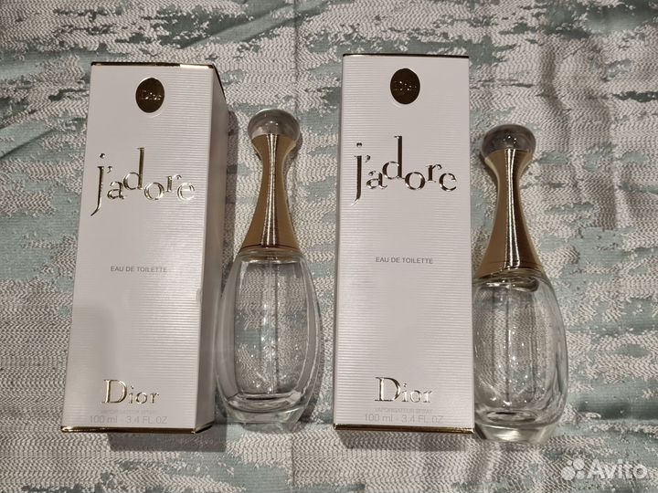 Пустые флаконы от парфюма Dior Jadore
