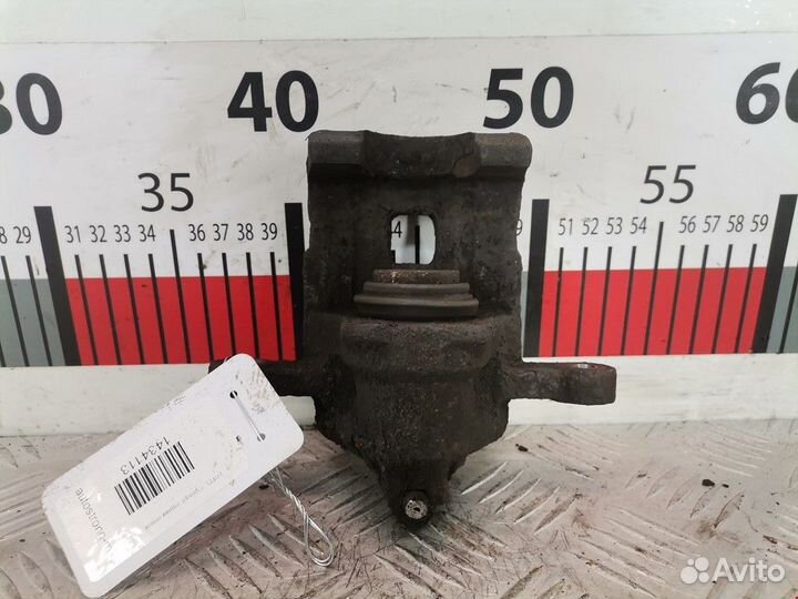 Суппорт задний левый Hyundai i20 PB 2010