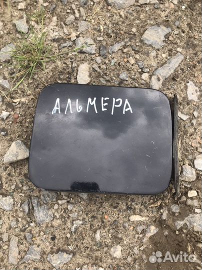 Лючок бензобака Nissan Almera Classic