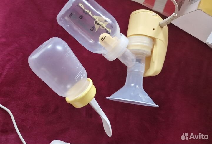 Молокоотсос medela электрический