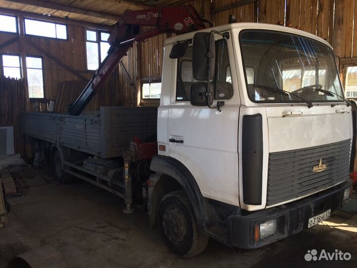 Эвакуатор с кран-манипулятором и люлькой