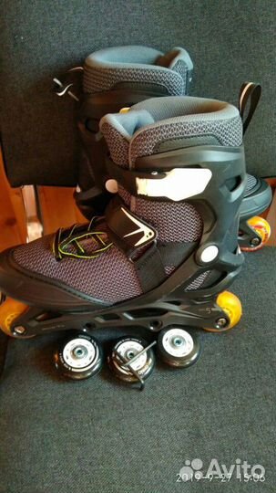 Роликовые коньки