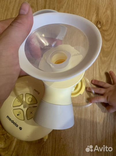 Молокоотсос medela электрический