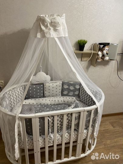 Детская кроватка круглая овальная с маятником