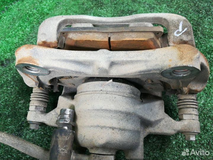 Суппорт тормозной передний правый Chevrolet Tracke