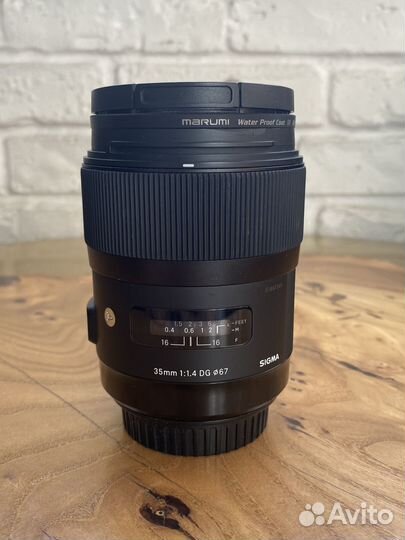 Объектив sigma 35 mm 1,4 для canon