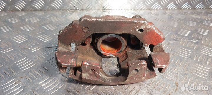 Суппорт тормозной передний правый Ford Fusion