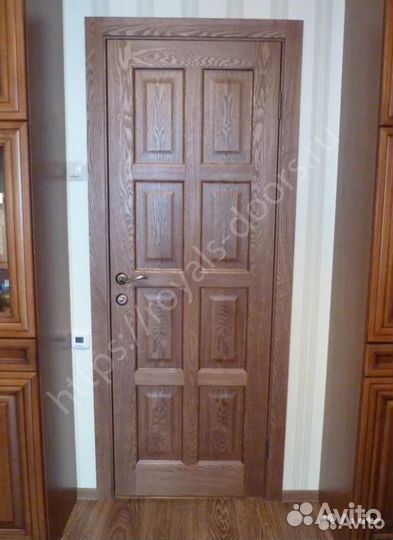 Элитная металлическая дверь из массива дерева