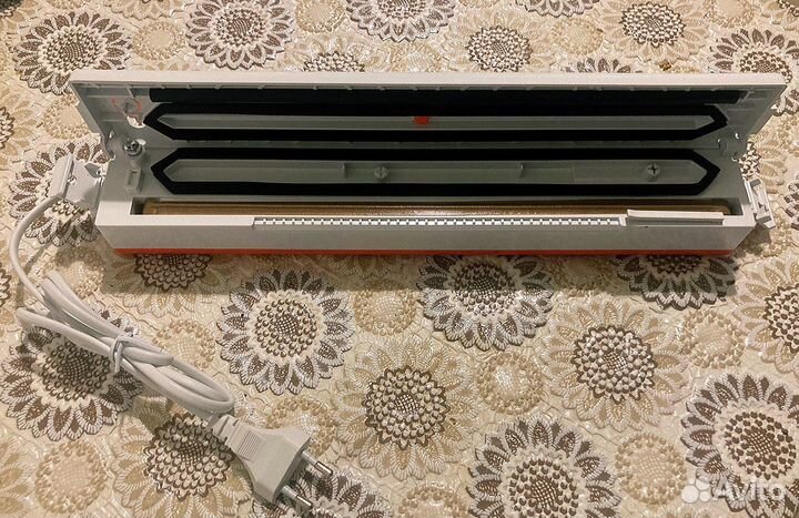 Вакуумный упаковщик