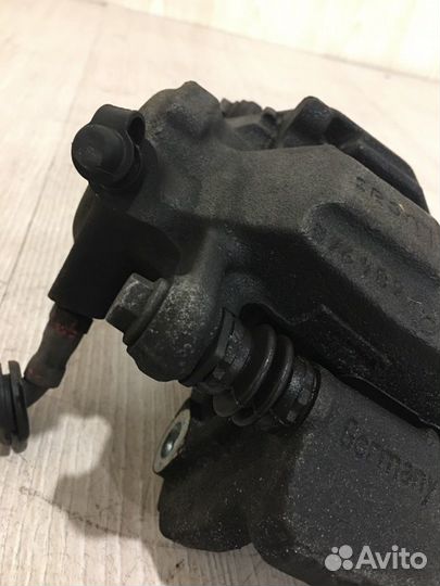 Суппорт тормозной передний левый Mercedes Benz