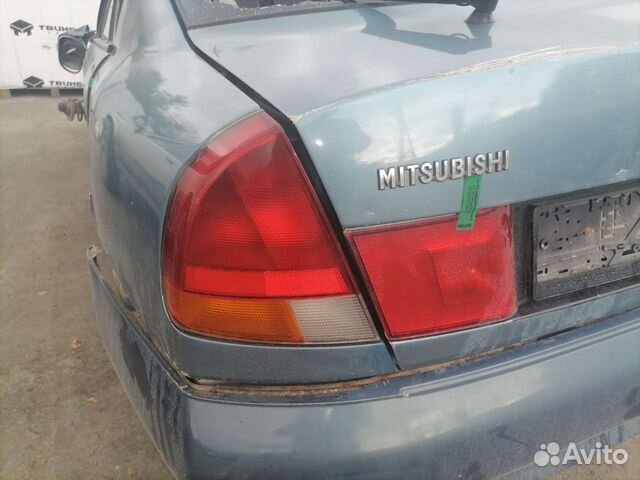 Фонарь задний Mitsubishi Carisma