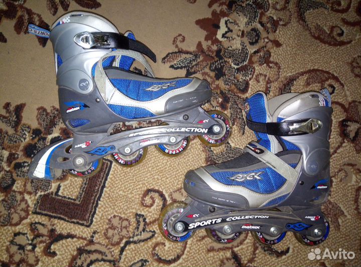 Роликовые коньки