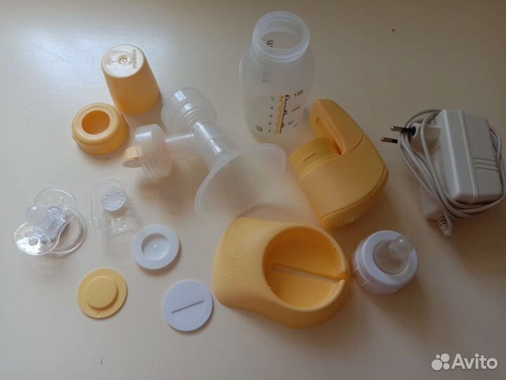 Молокоотсос medela электрический