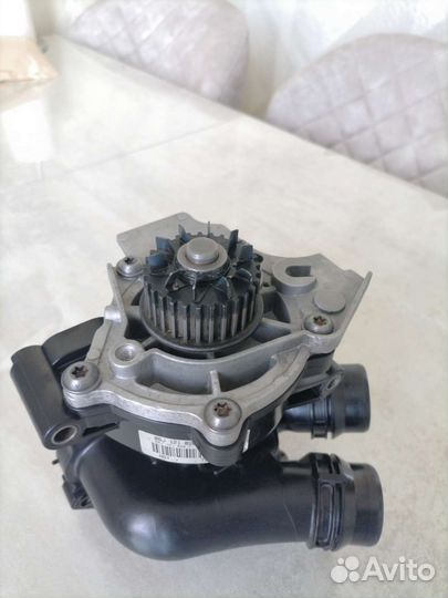 Помпа с термостатом в сборе VAG 06J121026F