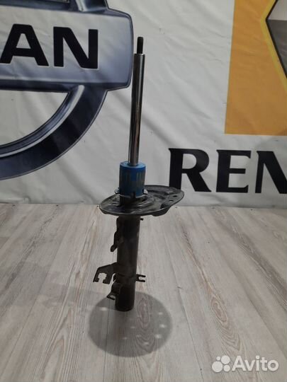 Амортизатор стойка перед Nissan X-trail T32 Лев