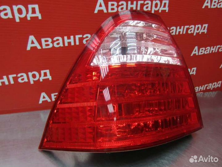 Фонарь левый Toyota Corolla E120 2004-2006